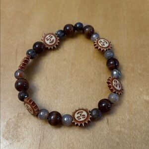 Brown Beaded Bracelet with Carved Accents